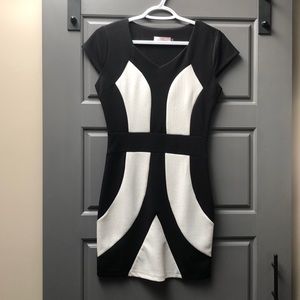 Black and white mini dress. Side zipper